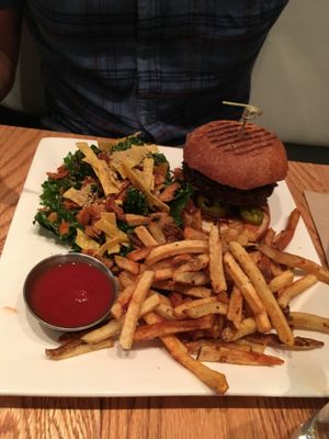 the "dreamer" burger - mushroom walnut patty, coconut bacon, pickled jalapeño, fried onions, mango bbq, cashew cheese or cheddar at Pure Kitchen - Elgin in Ottawa