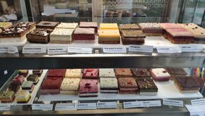 Vitrine with cakes at Sharp Sharp Food in Barendrecht