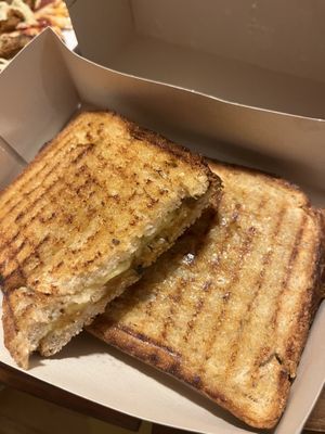 Alheira toastie (very cheesy and amazing)  at Green Beans in Lisbon