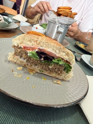 Half of the No beef burger. Patty was pea protein and soy    at Green Beans in Lisbon