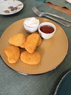 My little guy didn’t care for these nuggets.   at Green Beans in Lisbon