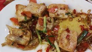 Tofu with lemongrass and chilli(half eaten) at Bao Anh in Ninh Binh