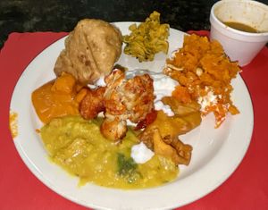 Sousa, spinach, yellow dal, carrot halwa, soup.  at Saravana Palace in Fairfax
