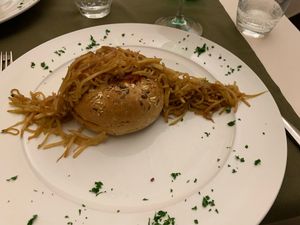 Seedy bread filled with pumpkin and chick-pea stew.  at Olives Restaurante in Funchal