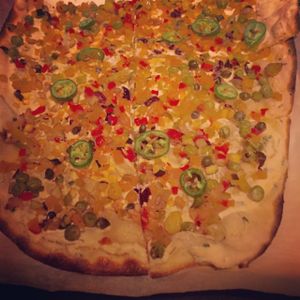 Vegan pizza with almond lemon ricotta, caponatina vegetables and Serrano peppers  at Wynn Hotel - Allegro in Las Vegas