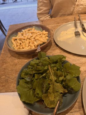 Pasta dish and salad   at Two Chaps in Marrickville
