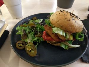 Terapija tempeh burger with burger sauce, without mayo at Terapija in Riga