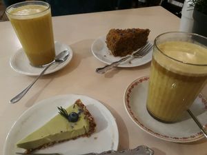 Turmeric lattes and cake at Terapija in Riga