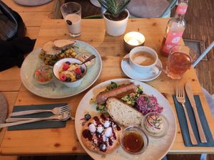 Emmi (left) and Ultimate breakfast plates at Emmi's Kitchen - Glockenbach in Munich