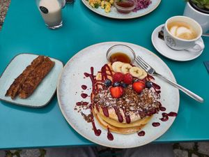 Pancakes with a side of sausage at Emmi's Kitchen - Glockenbach in Munich
