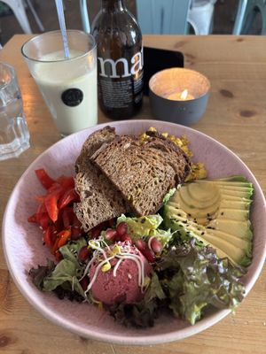 Breakfast bowl and matcha latte  at Emmi's Kitchen - Glockenbach in Munich