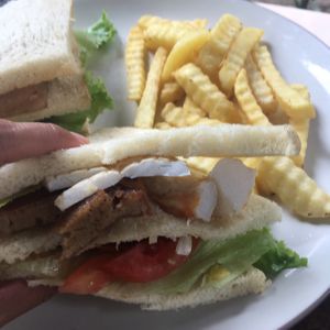 club sandwich! has mock pork (so good) and prawns and squid.  at Bali Maitreya Cafe in Lembongan