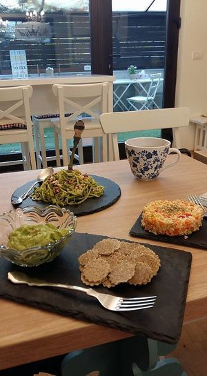 All the food we had: crackers with guacamole, vegetable "rice," "spaghetti." at Rawyal Brunch & Cakes in Bucharest