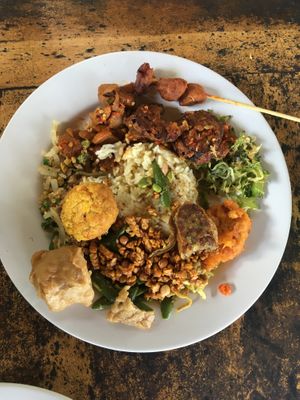 Vegan plate from the buffet, around 15k, served with vegetables soup at Trihita Vegan in Dalung