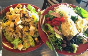 Spicy citrus tofu salad (sweet chili lime tofu) and a Mediterranean salad with homemade hummus,  both freshly made to order. 😋 at SunShine Cafe - Front St in Keyport