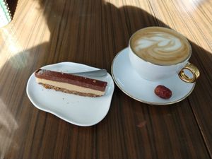 Peanut chocolate cake, cappuccino at LAS in Sopot