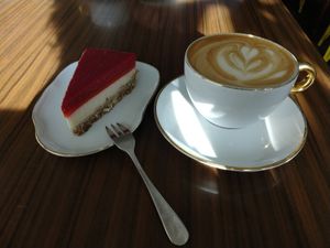 Raspberry cake, cappuccino at LAS in Sopot