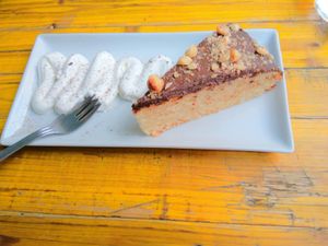 Tarta de chocolate y frutos secos at Pura Vida Vegan Bar in Madrid