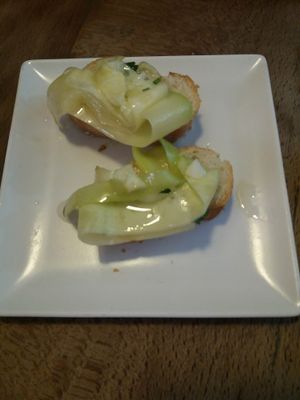 Pickled zucchini on bread at Pura Vida Vegan Bar in Madrid