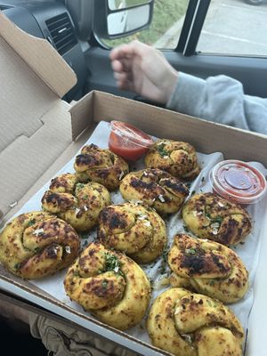 Garlic knots with tomato sauce  at Virtuous Pie  in Vancouver