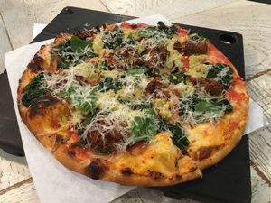 Meatballs and chèvre pizza  at Virtuous Pie  in Vancouver