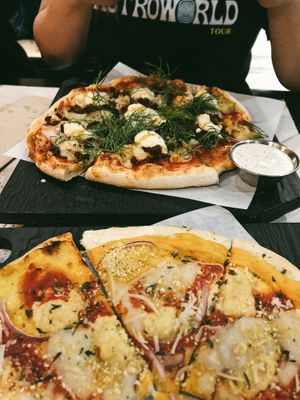 Pictured on top: Spicy Chorizo pie with side of ranch, bottom: Grandma Pie! at Virtuous Pie  in Vancouver