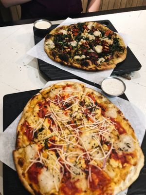 Top: Ultraviolet, Bottom: Grandma Pie (the besssttt IMO) with side of Blue cheese sauce and Garlic ranch at Virtuous Pie  in Vancouver
