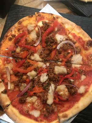 Sweet pepper and sausage pizza  at Virtuous Pie  in Vancouver
