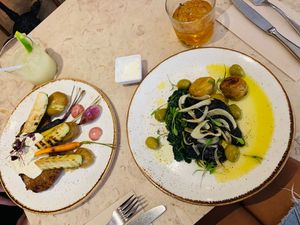 Seitan steak and tofu dishes at 26 Vegan Food Project in Lisbon