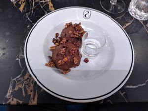 2 balls Mousse de chocolate, with some (for me not needed) orange liqueur at 26 Vegan Food Project in Lisbon