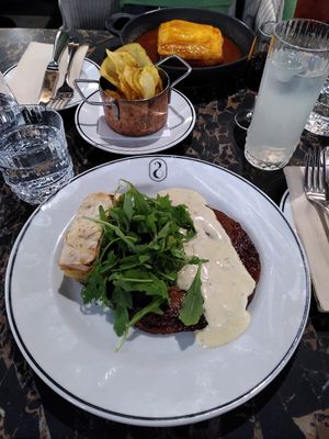 Seitan steak and Francesinha at 26 Vegan Food Project in Lisbon