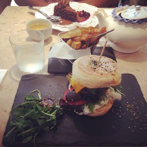 Vegan lentils burger with caramelized onions, tomato, mushrooms, homemade mayonnaise and vegan cheese at 26 Vegan Food Project in Lisbon