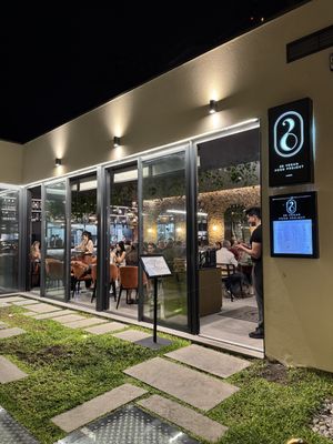 View from outside (down a flight of stairs from the street)  at 26 Vegan Food Project in Lisbon