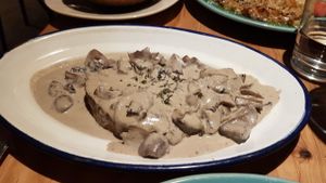 seitan steak - very filling meal. Copmes with sweet potato fries and small green salad at 26 Vegan Food Project in Lisbon