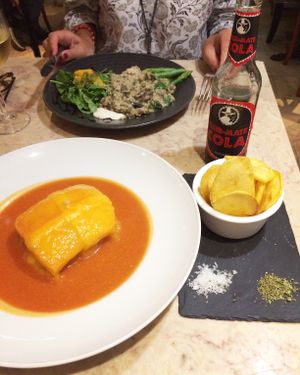 Francesinha and walnut risotto at 26 Vegan Food Project in Lisbon