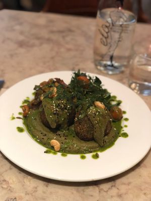 Plate of the day: basmati balls stuffed with mushroom, asparagus, dried tomatoes and vegan blue cheese at 26 Vegan Food Project in Lisbon