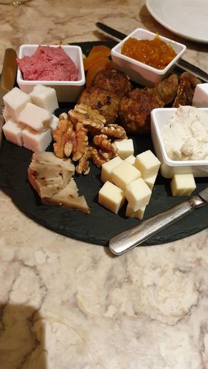Cheese plate with "alheira" balls and jam at 26 Vegan Food Project in Lisbon