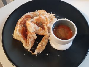 Roti with curry sauce at Kindness Vegan in Darlinghurst