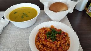 Broccoli soup, bell pepper stew and bun at Pur & Simplu in Constanta