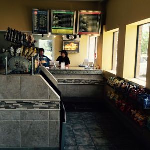cashier and menu at Baguette de France in Berrien Springs