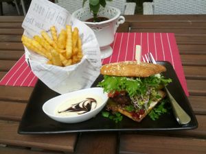 Traveller's Veggieburger and french fries with vegan sauce at Kohvik Kroon in Parnu
