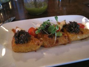 Wild mushroom bruschetta with on crispy polenta. This is one of the best things I've eaten at L'Gros Luxe. There is even great vegan cheese from VegNature on it.  at L'Gros Luxe 100% Vege in Montreal