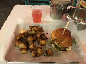 Schnitzel (soy with panko) burger, potato wedges and lemonade at Rainbow - Ibn Gvirol in Tel Aviv