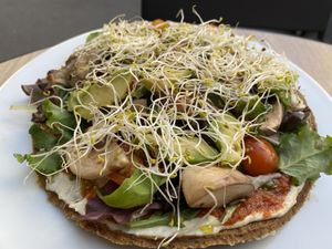 Vegan raw pizza  at Sweet Rawmance in Paris
