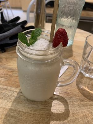 Mango smoothie with paper straw. Amazing. Not too sweet or sour.  #Veganuary at Sweet Rawmance in Paris