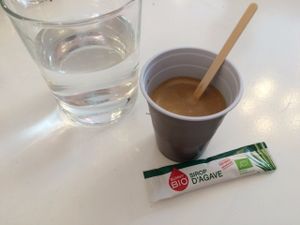 Coffee is served with agave syrup, as they don't use sugar. Cute! at Sweet Rawmance in Paris