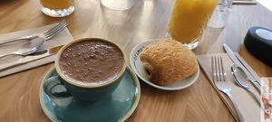 Hot chocolate and "pain au chocolat" at Sweet Rawmance in Paris