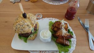 Vegan burger and potatoes at Sweet Rawmance in Paris