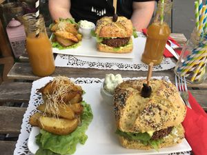 Juice, burger and fries at Sweet Rawmance in Paris
