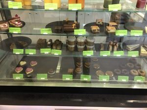 Showcase with plenty of cakes 😍 at Sweet Rawmance in Paris